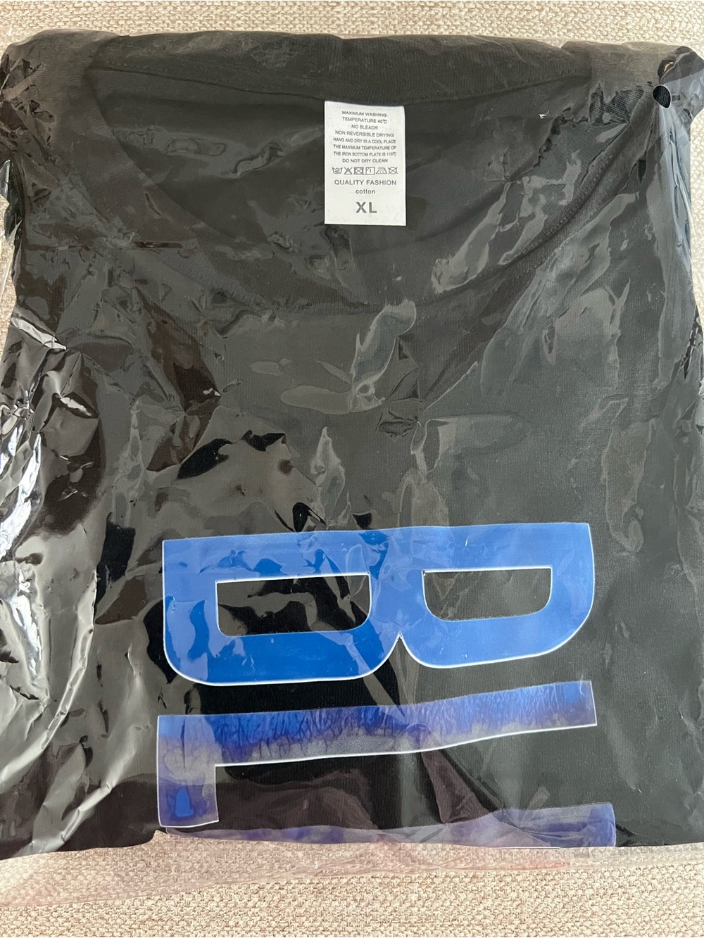 Black Graphic Tee with Large Blue Logo